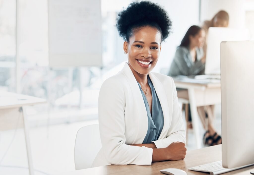 Leadership, happy and portrait of a businesswoman in the office with a computer working on a projec